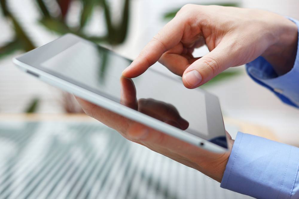 Person using a tablet computer